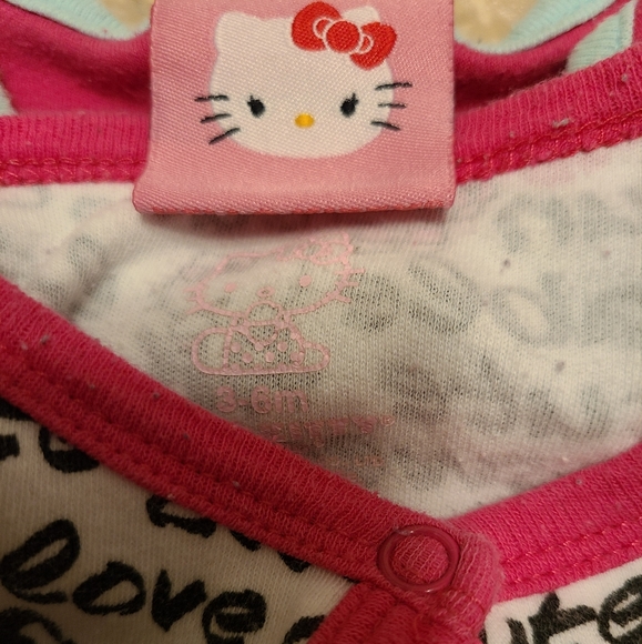 Two Hello Kitty footed long sleeved sleepers - Picture 2 of 3